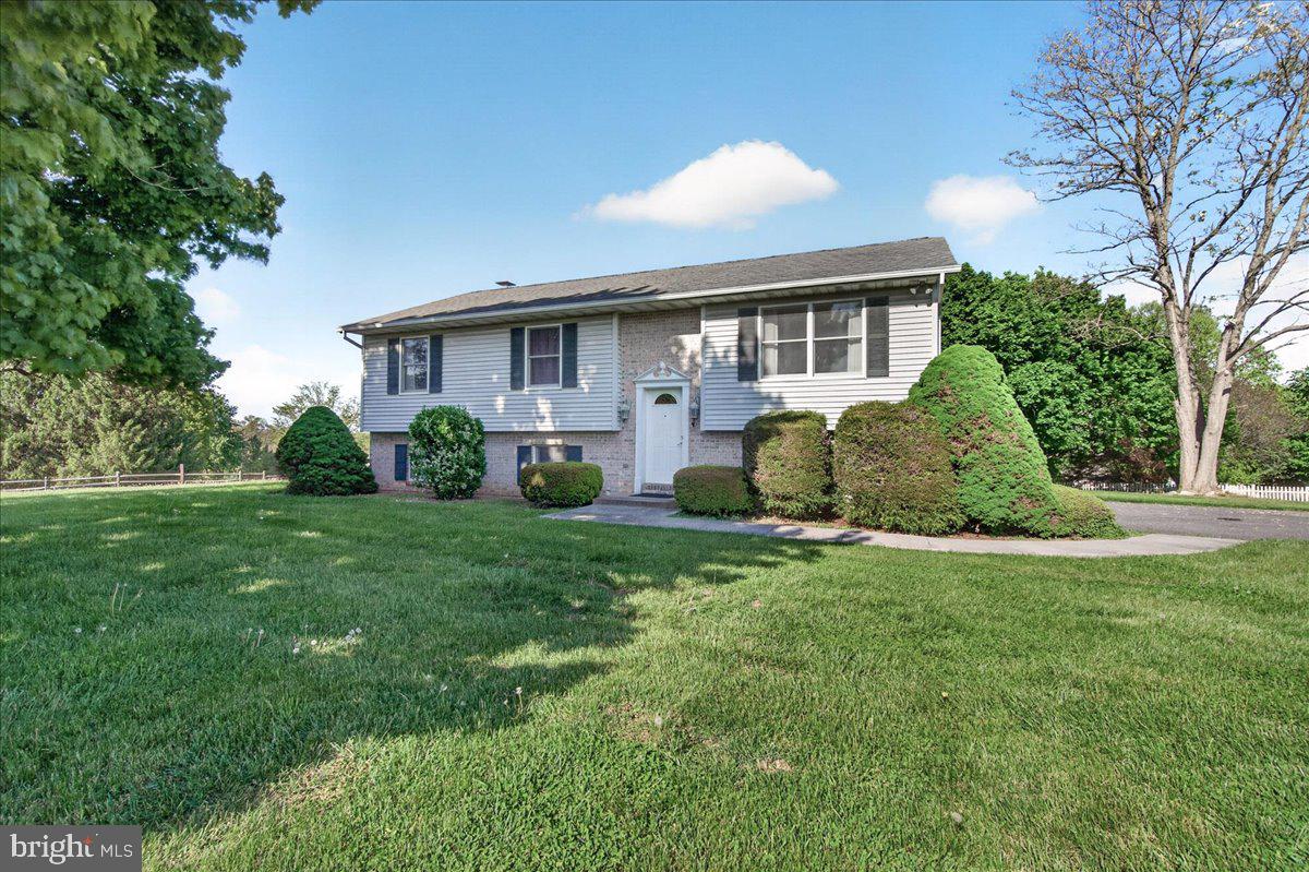 4715 Green Valley Road Monrovia, MD 21770 - Photo 1 of 36 a view of a house with a yard