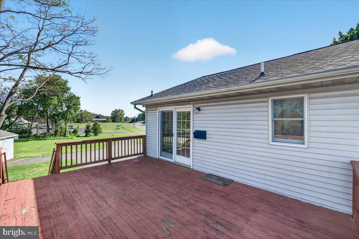 4715 Green Valley Road Monrovia, MD 21770 - Photo 11 of 36 a view of a house with a wooden deck