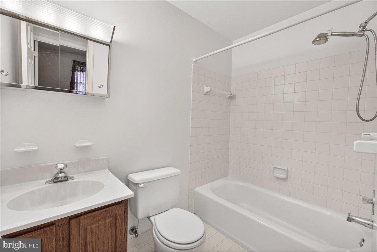 4715 Green Valley Road Monrovia, MD 21770 - Photo 21 of 36 a bathroom with a sink toilet and shower
