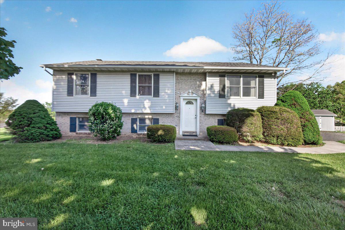 4715 Green Valley Road Monrovia, MD 21770 - Photo 28 of 36 a front view of house with yard and green space