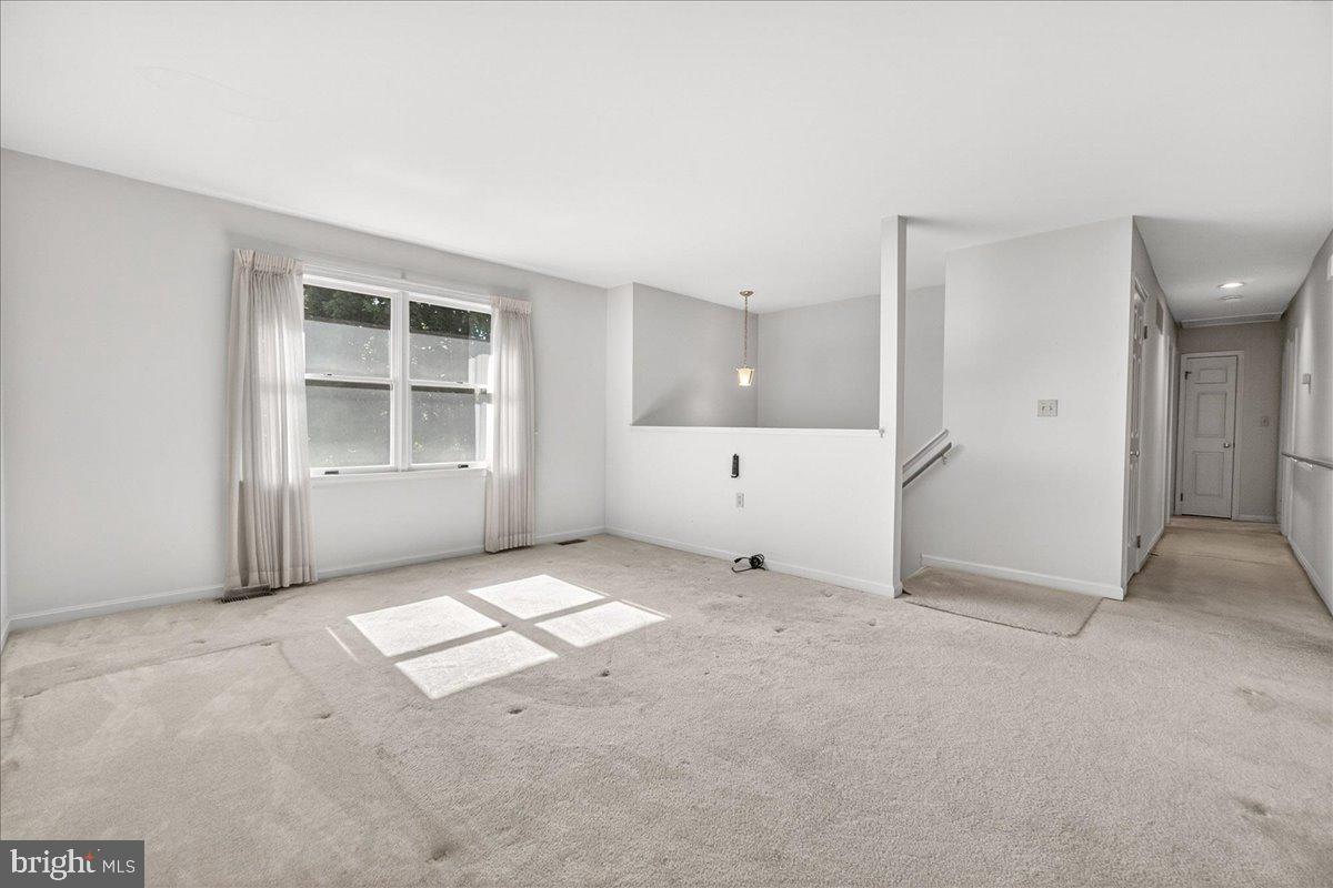 4715 Green Valley Road Monrovia, MD 21770 - Photo 5 of 36 an empty room with windows
