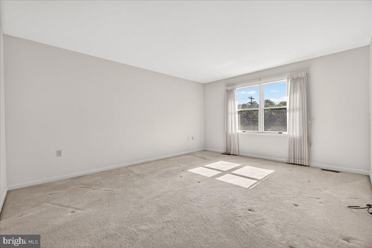 4715 Green Valley Road Monrovia, MD 21770 - Photo 7 of 36 an empty room with windows