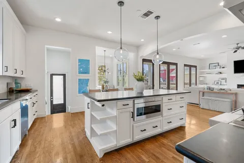 a dining room with furniture window wooden floor