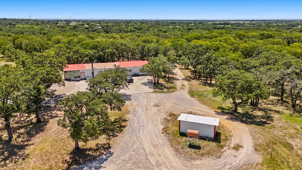 283 County Road 4794 Boyd, TX 76023 - Photo 11 of 17 an aerial view of a house with a yard
