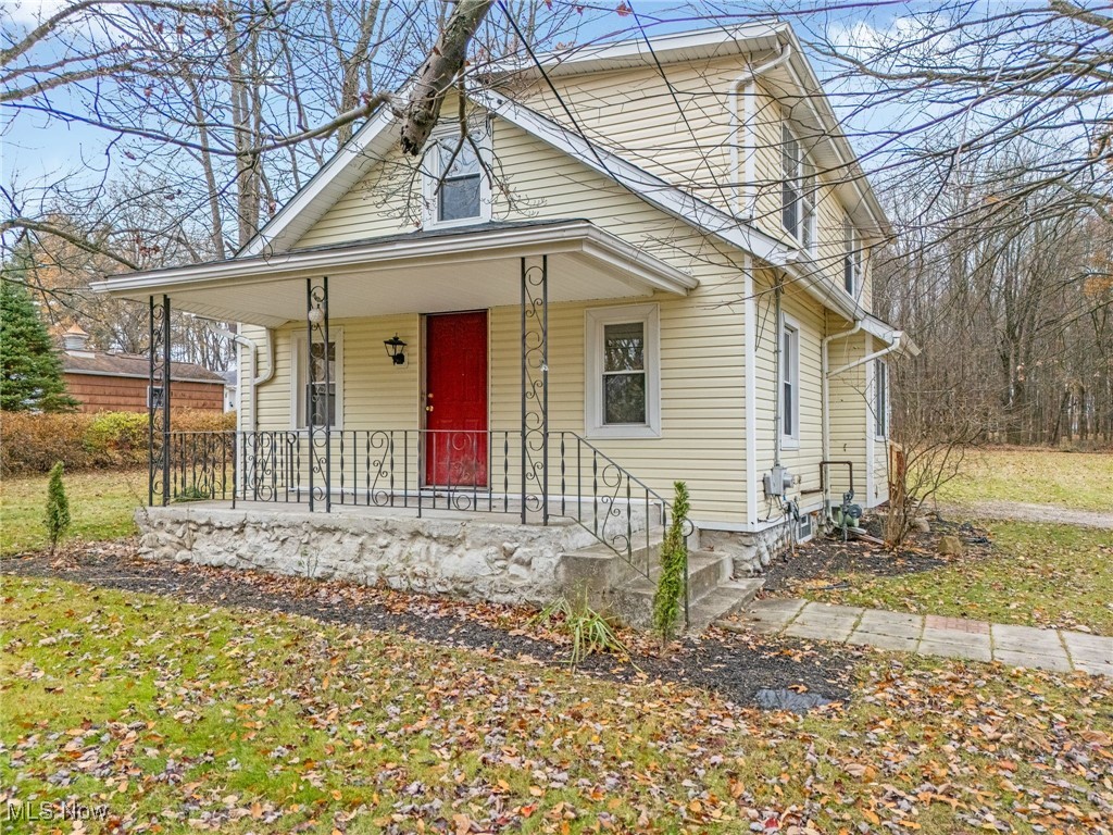 3426 Marsh Road Stow, OH 44224 - Photo 2 of 37 Bungalow-style house featuring a porch and a front lawn