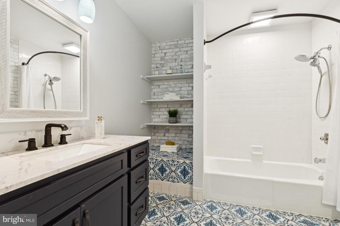 5020 Pheasant Ridge Road Fairfax, VA 22030 - Photo 19 of 59 Primary bathroom with new vanity