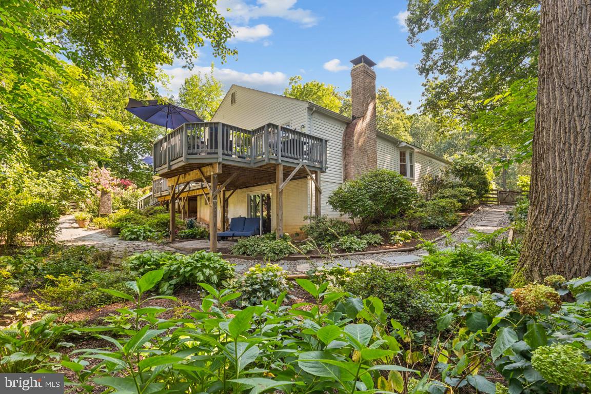 5020 Pheasant Ridge Road Fairfax, VA 22030 - Photo 34 of 59 Fully fenced rear yard with lush landscaping