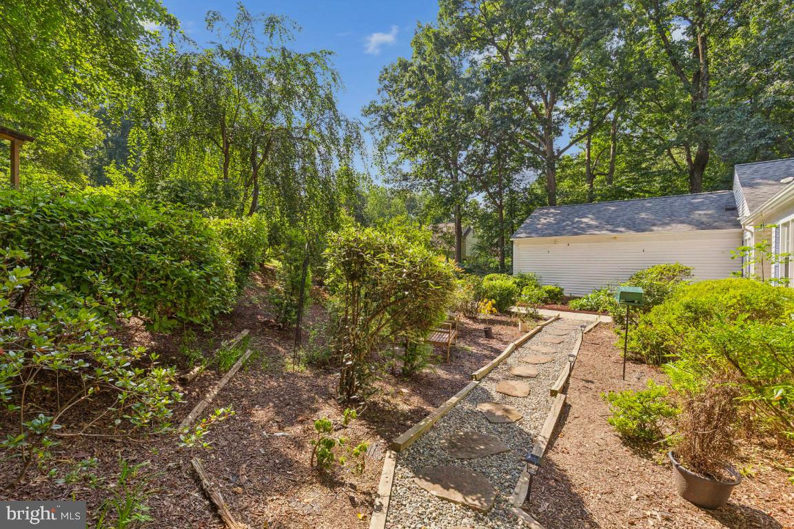 5020 Pheasant Ridge Road Fairfax, VA 22030 - Photo 55 of 59 Paved path from front to right side yard