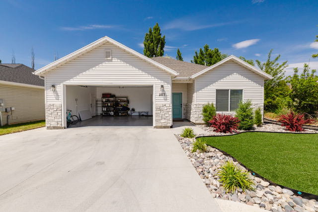 287 East 1000 North Logan, UT 84321 - Photo 4 of 41 Single-story residence featuring white siding and stone accents