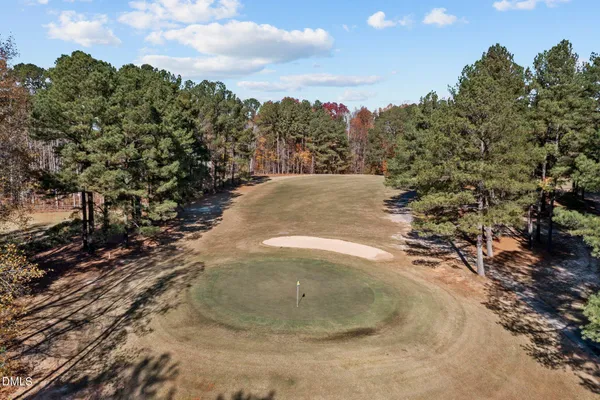 a view of a swimming pool and lake view