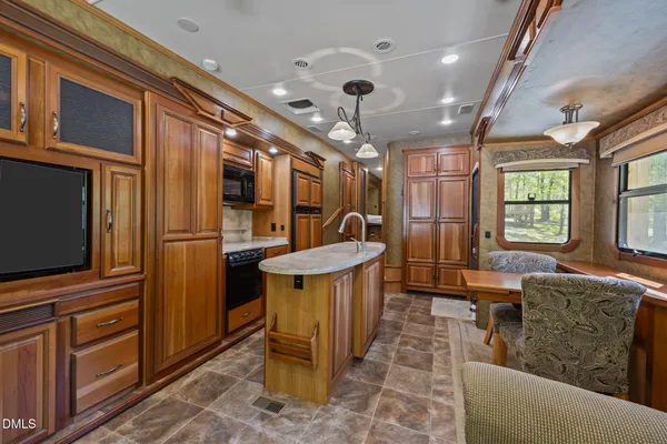 a living room with a table and a window