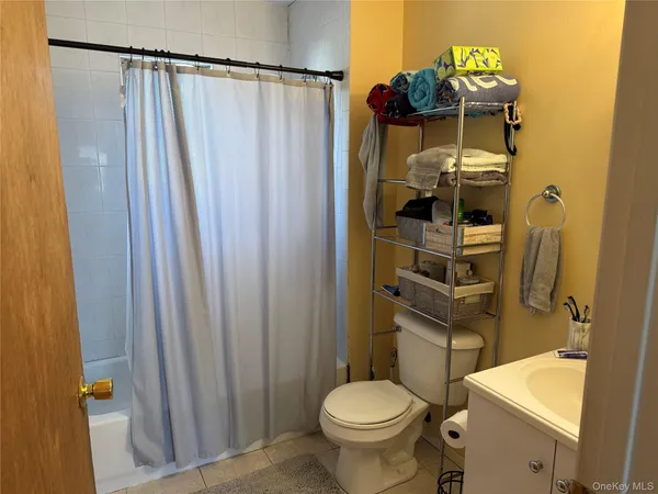 a bathroom with a sink and toilet
