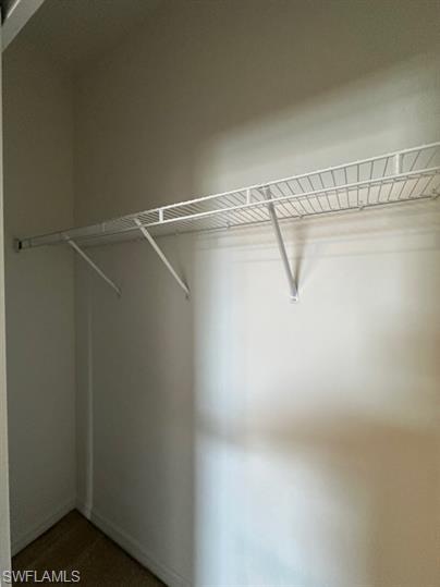 14732 Sutherland Avenue, Unit 332 Naples, FL 34119 - Photo 25 of 35 a view of a room with racks on the wall