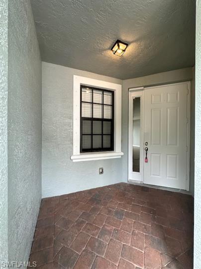 14732 Sutherland Avenue, Unit 332 Naples, FL 34119 - Photo 3 of 33 Doorway to property