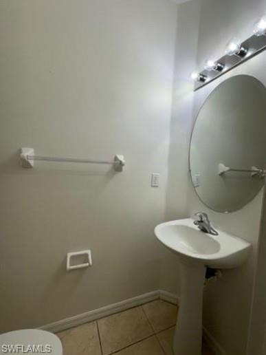 14732 Sutherland Avenue, Unit 332 Naples, FL 34119 - Photo 5 of 33 Bathroom featuring light tile patterned floors and toilet