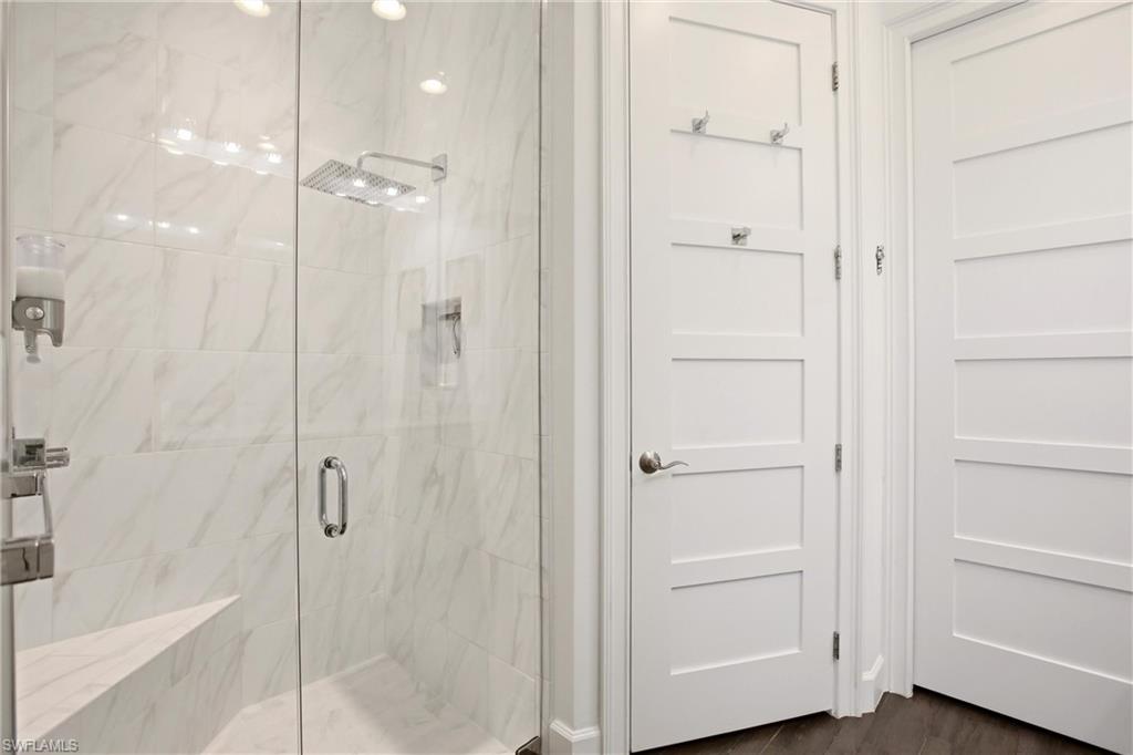 7157 Dominica Drive Naples, FL 34113 - Photo 24 of 39 a bathroom with a shower