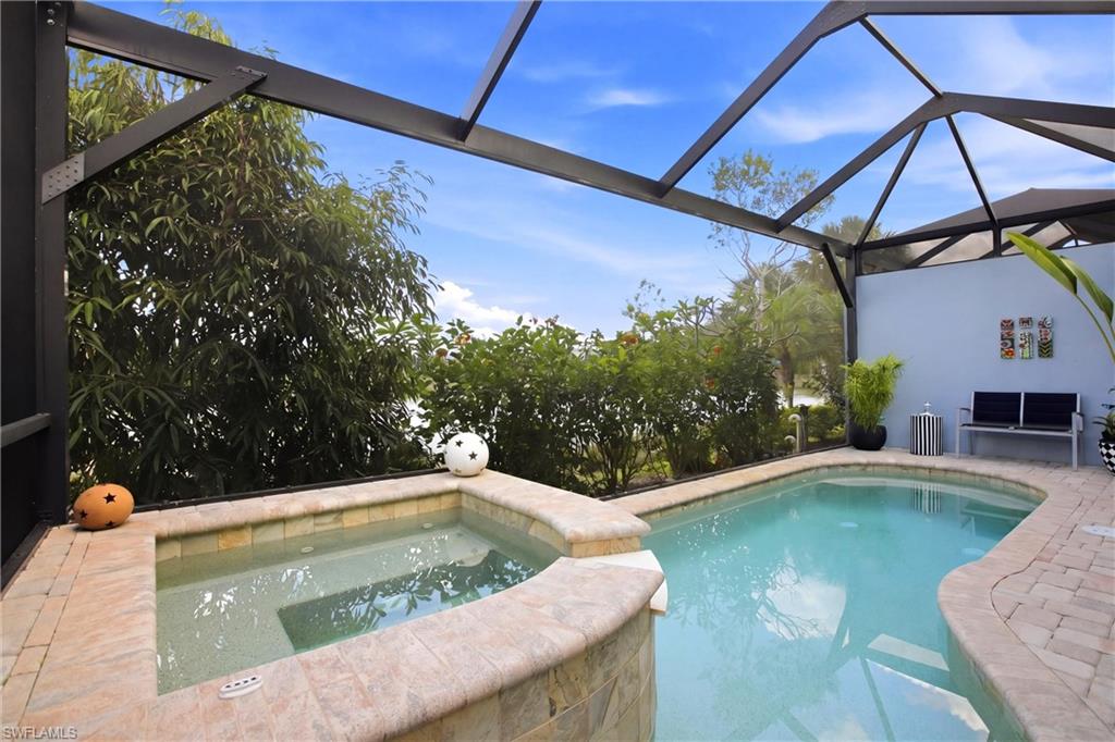 7157 Dominica Drive Naples, FL 34113 - Photo 30 of 39 a view of swimming pool from a balcony