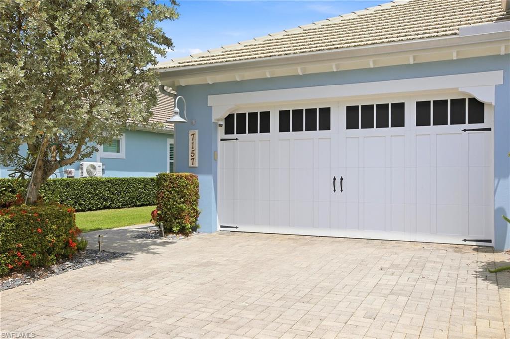 7157 Dominica Drive Naples, FL 34113 - Photo 39 of 39 a view of a house with a yard