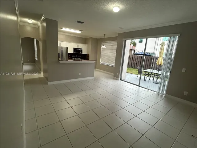 an empty room with sliding door