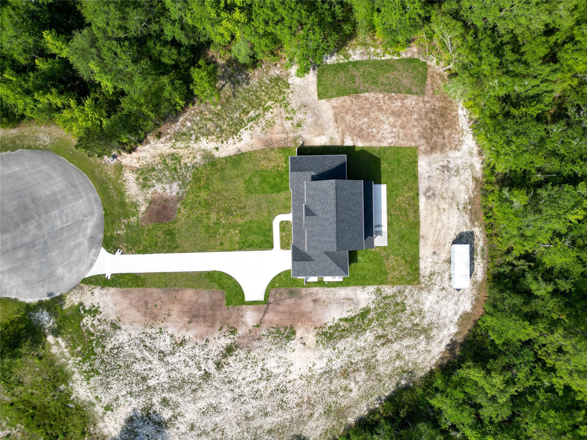 15466 Bullock Bluff Road Bryceville, FL 32009 - Photo 3 of 54 an aerial view of a house with a yard