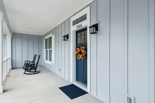 a very nice looking dining room with wooden floor