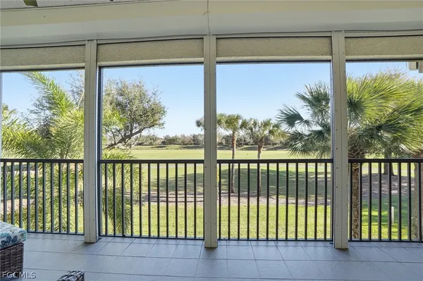 a view of a room with a large window