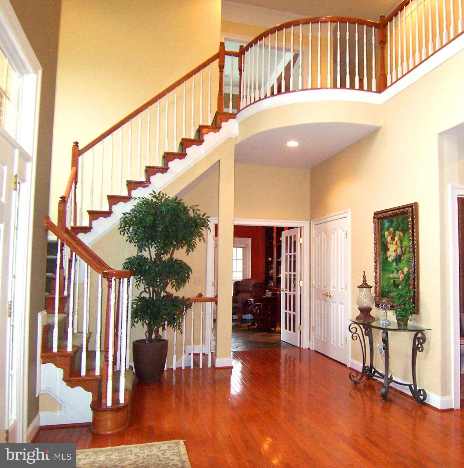 19123 Stream Crossing Court Leesburg, VA 20176 - Photo 3 of 30 Lovely offset staircase creates extra space