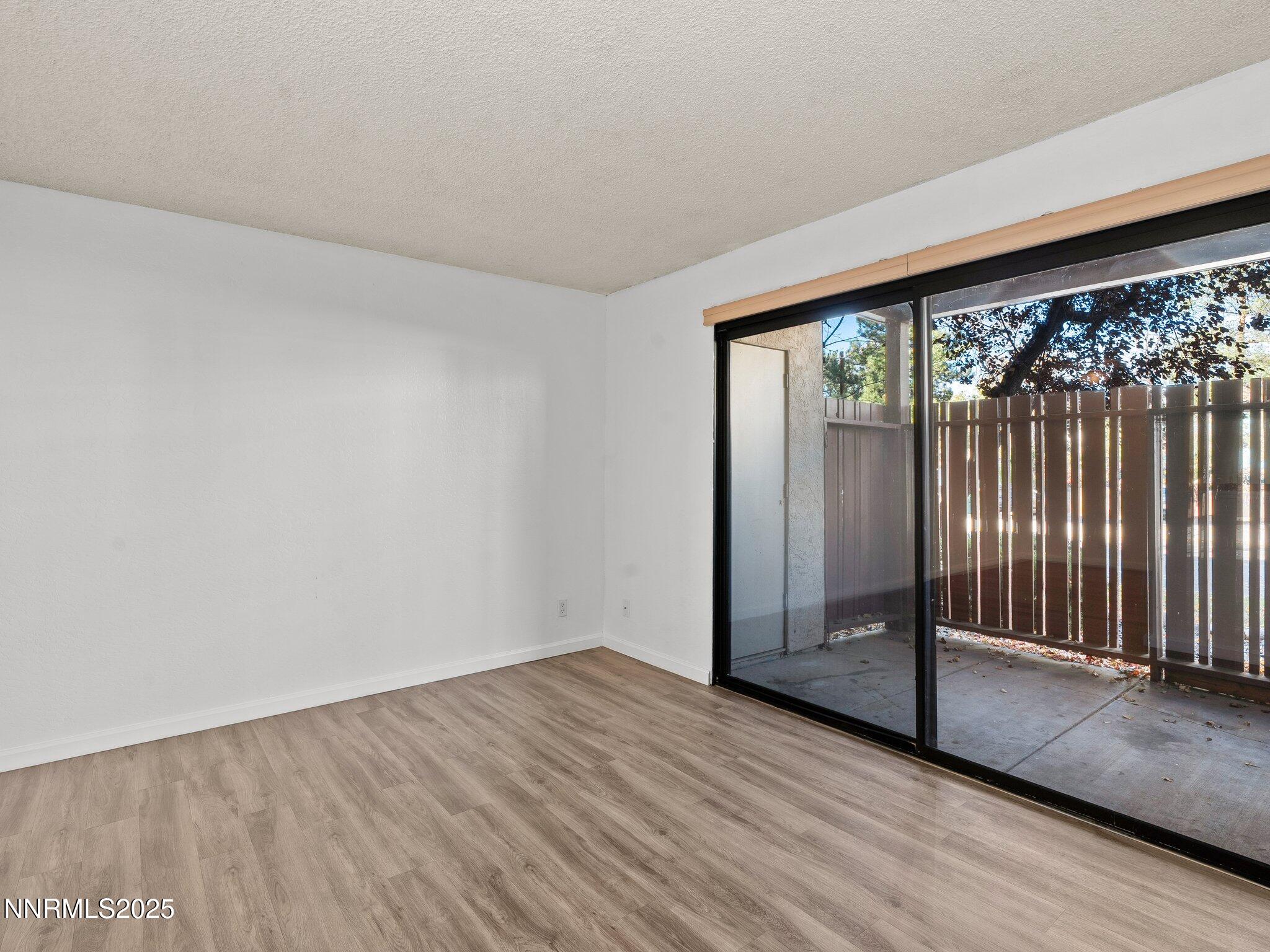 2955 Lakeside Drive, Unit 111 Reno, NV 89509 - Photo 21 of 45 wooden floor in an empty room