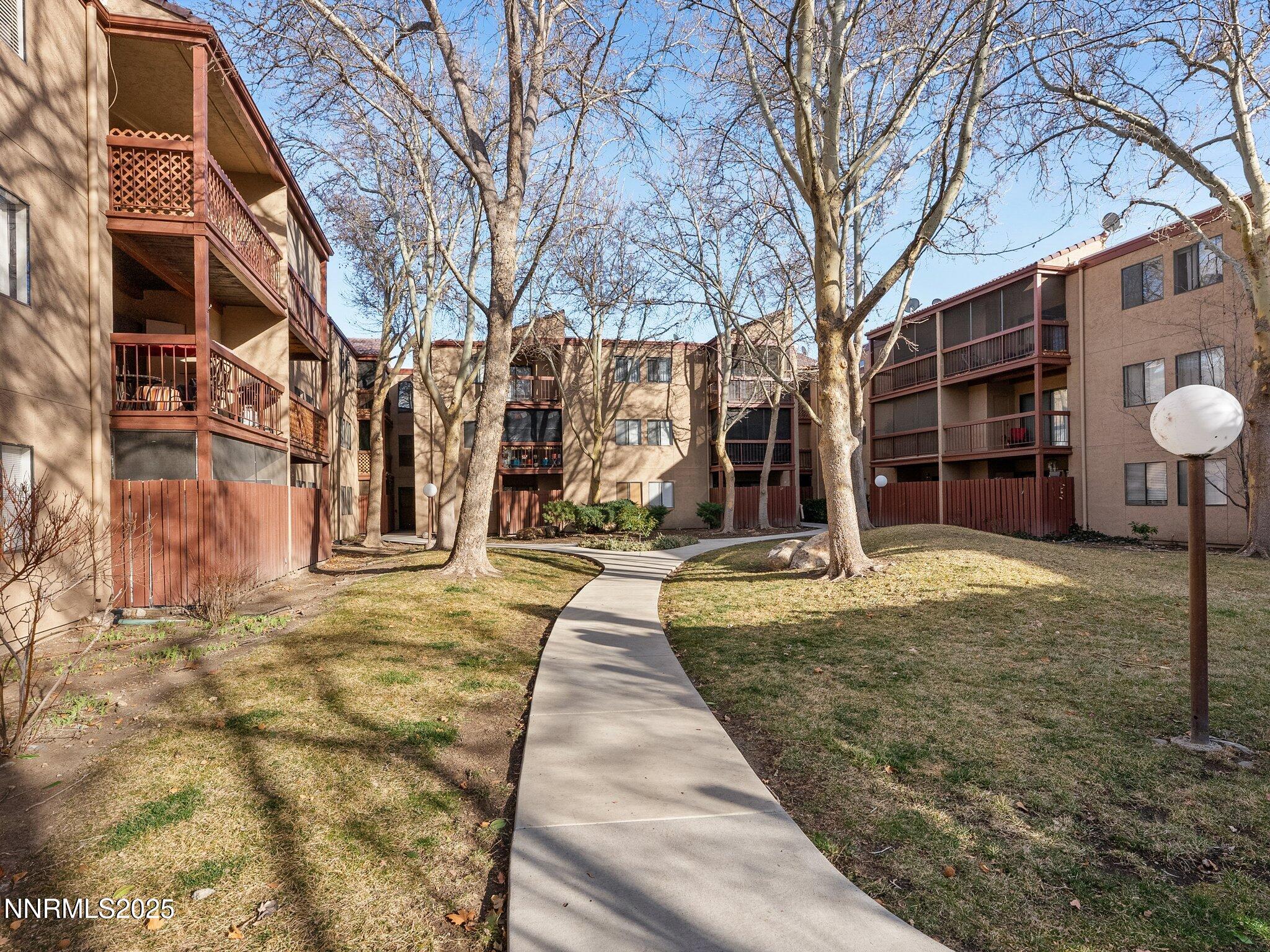 2955 Lakeside Drive, Unit 111 Reno, NV 89509 - Photo 42 of 45 a view of a yard with brick walls