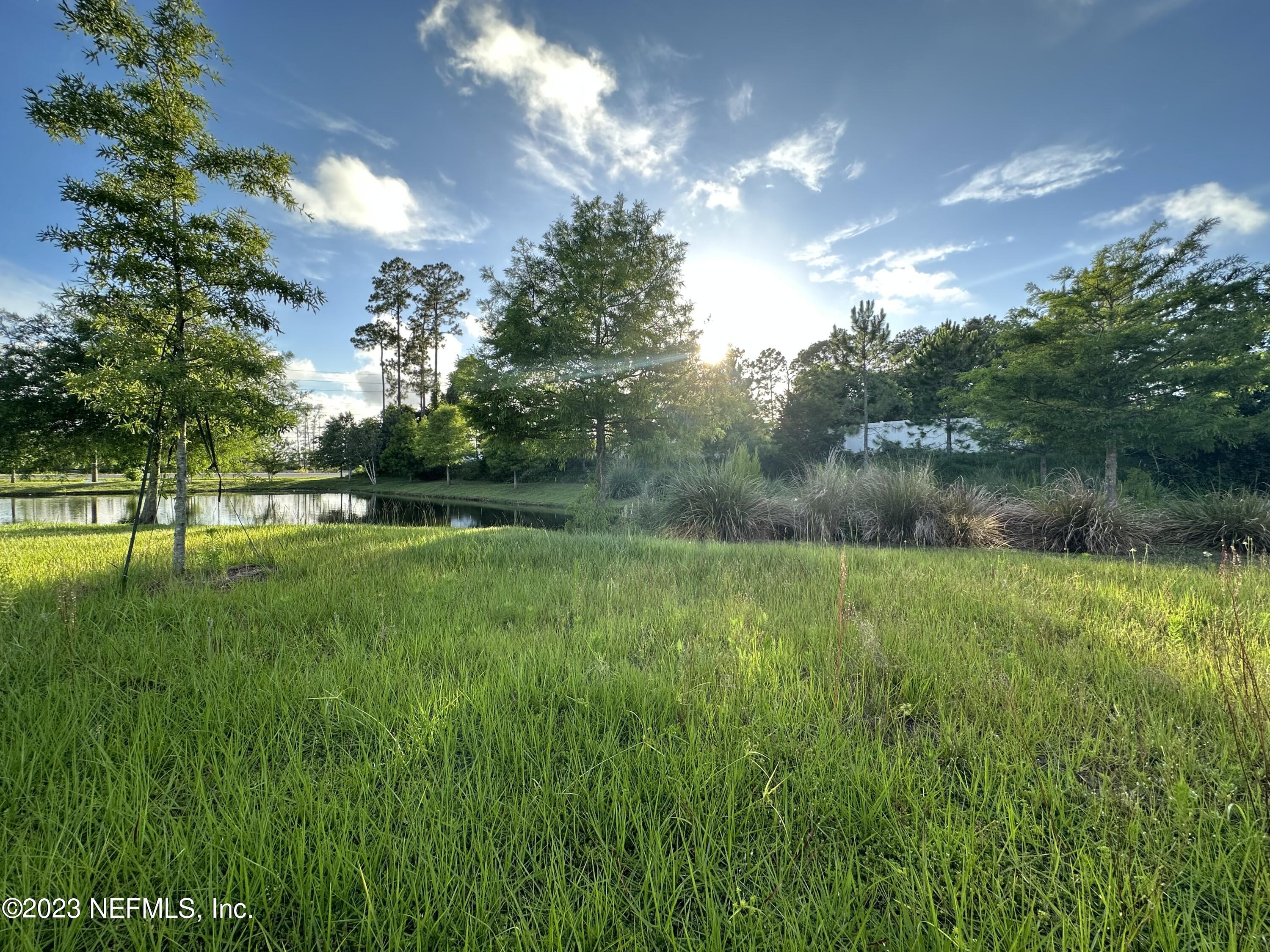 137 Chasewood Drive St. Augustine, FL 32095 - Photo 22 of 29 a view of outdoor space with deck and yard