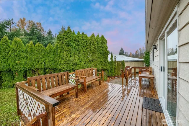 a view of roof deck with patio