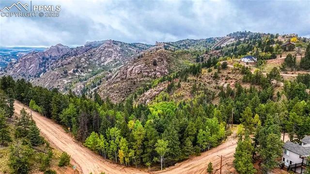 a view of a garden with a building