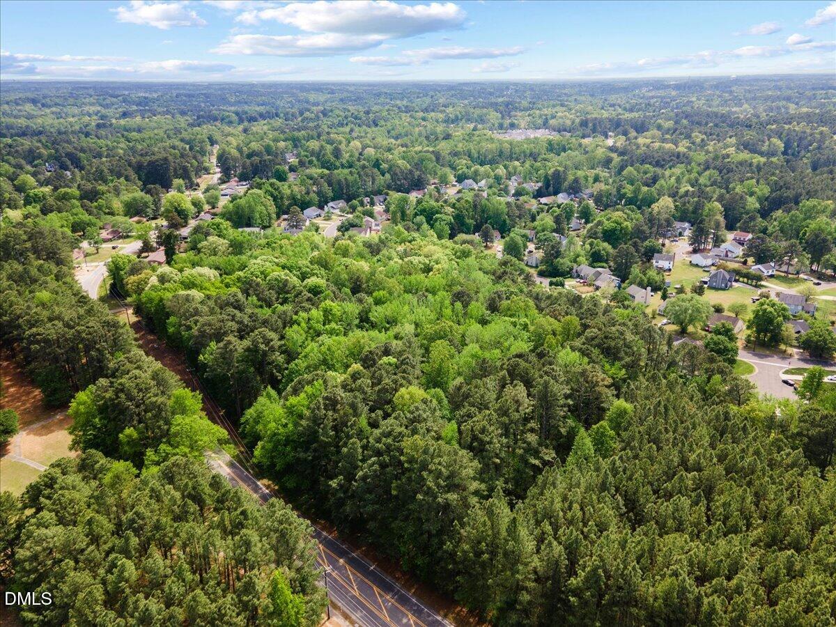631-633 Clayton Road Durham, NC 27703 - Photo 13 of 17 a view of a city with lush green forest