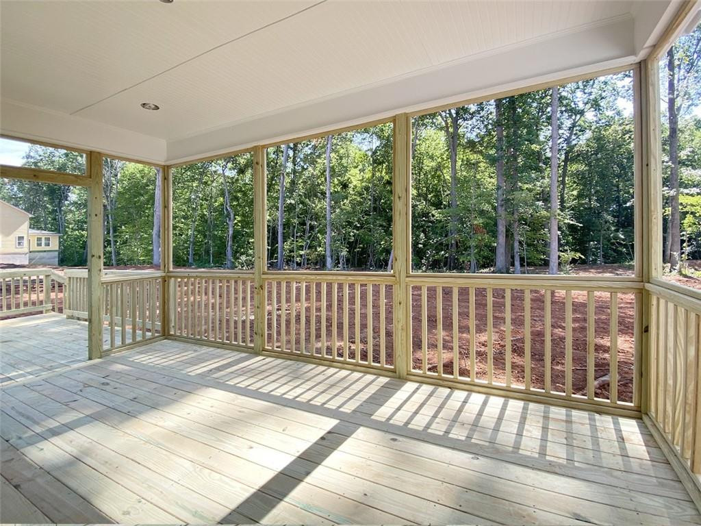 7584 Cypress Drive Graham, NC 27253 - Photo 11 of 18 a view of a wooden balcony