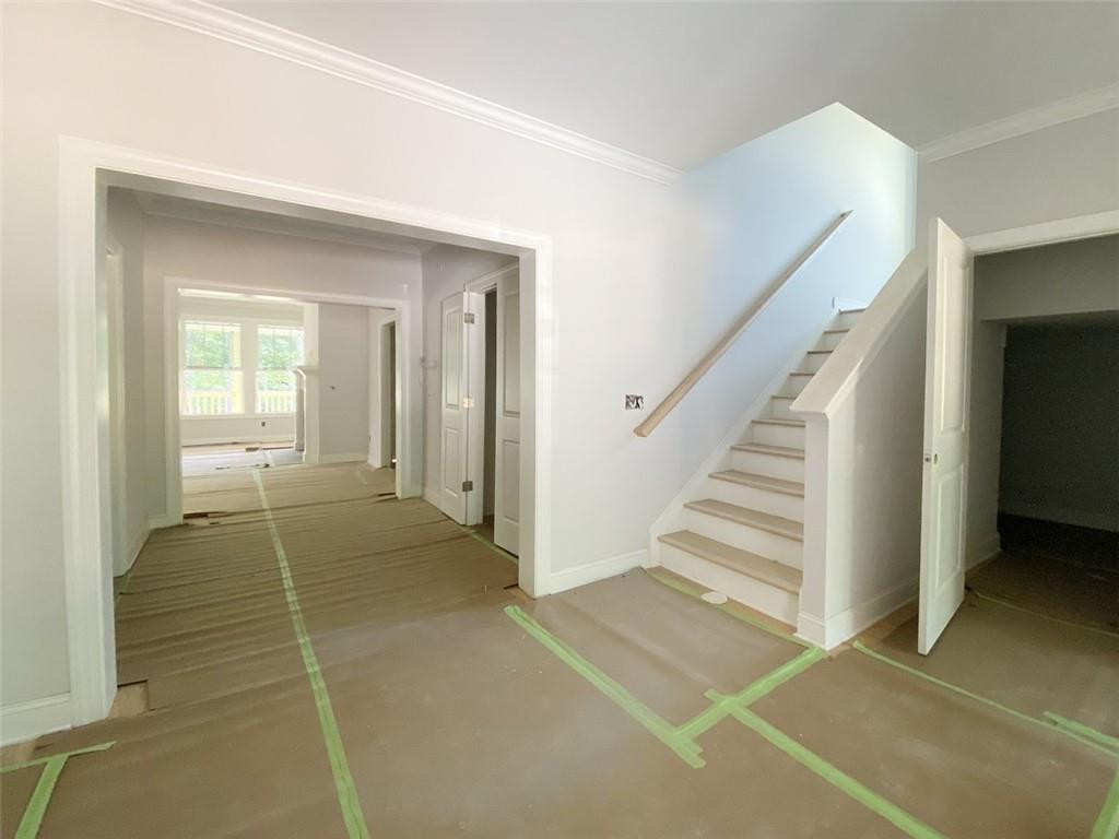 7584 Cypress Drive Graham, NC 27253 - Photo 2 of 18 a view of a room with wooden floor and windows