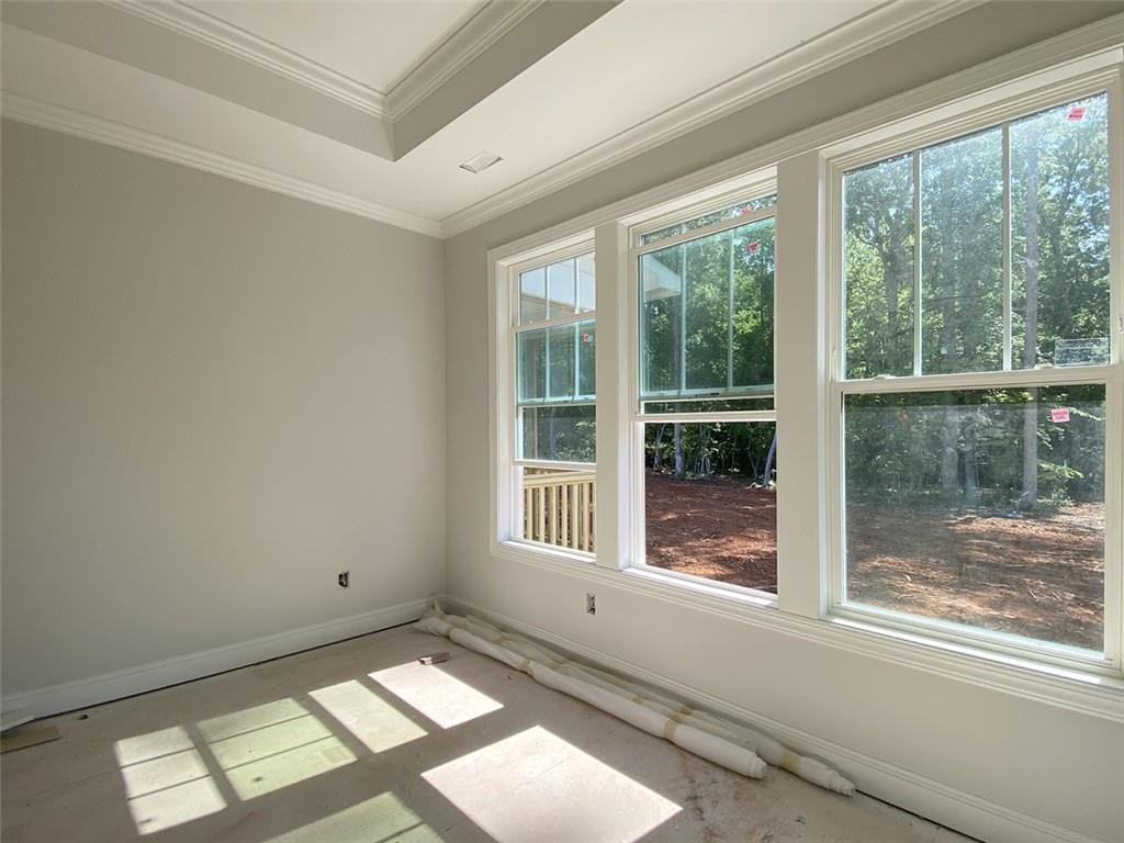 7584 Cypress Drive Graham, NC 27253 - Photo 8 of 18 a view of an empty room with a window