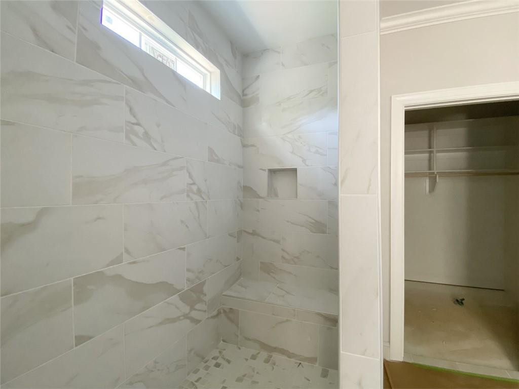 7584 Cypress Drive Graham, NC 27253 - Photo 10 of 18 a bathroom with a shower