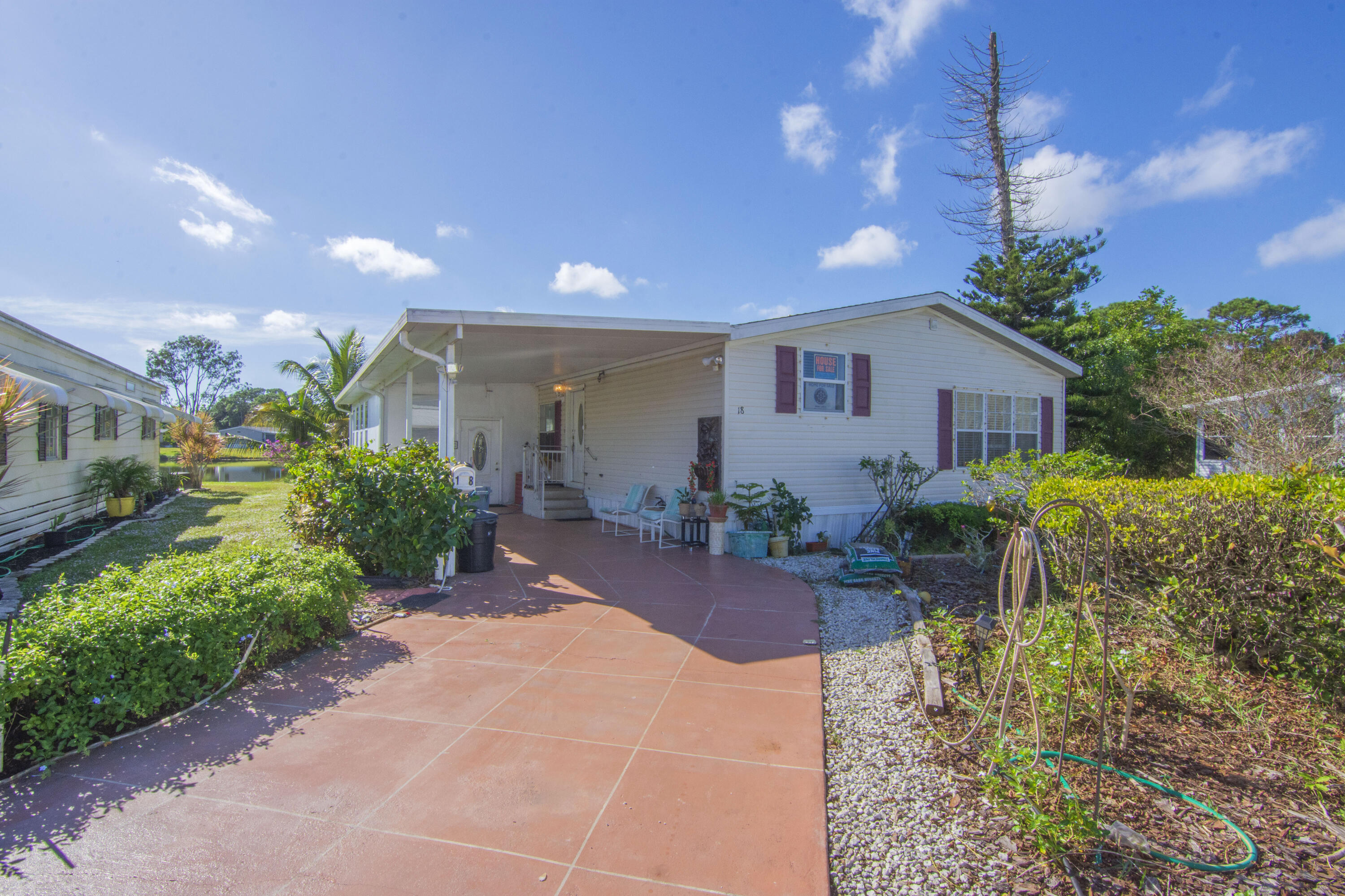 a house view with a garden space