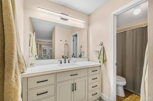 a bathroom with a shower curtain