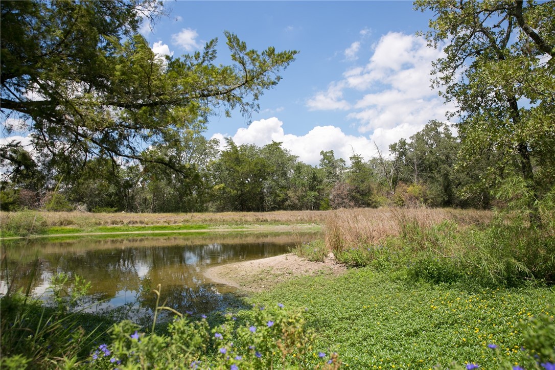 a view of a lake with outdoor space