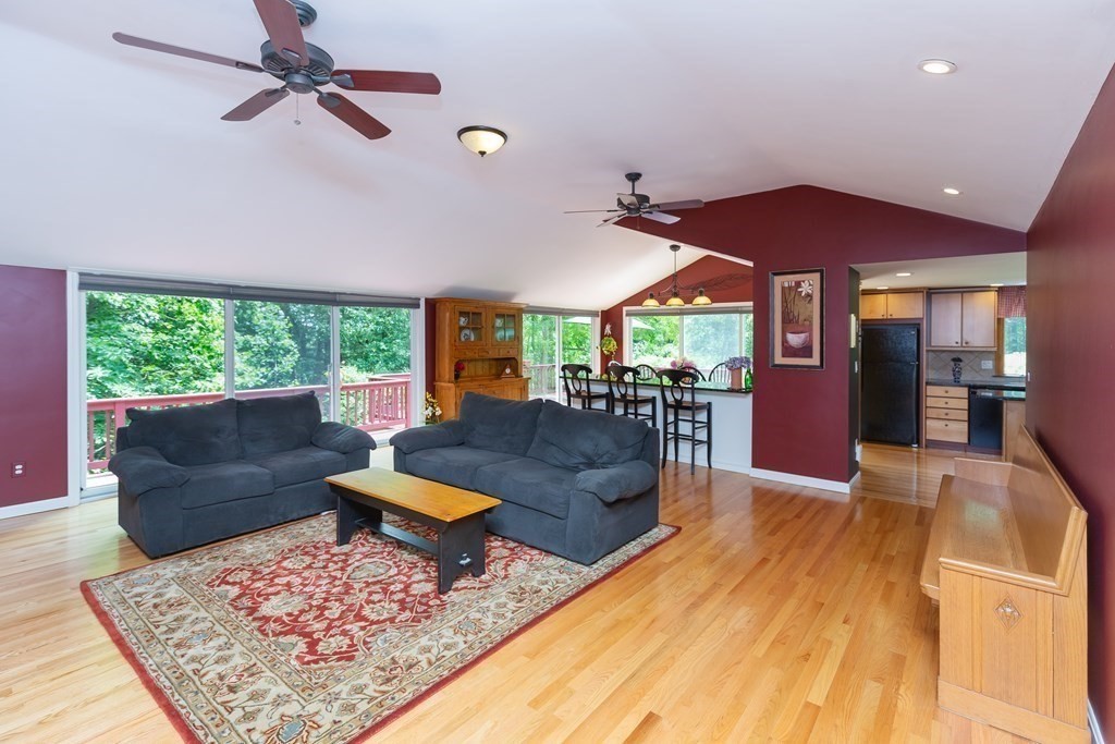 27 Algonquin Road Canton, MA 02021 - Photo 12 of 42 a living room with furniture and a rug