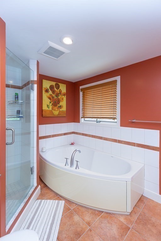 27 Algonquin Road Canton, MA 02021 - Photo 28 of 42 a spacious bathroom with bathtub and shower