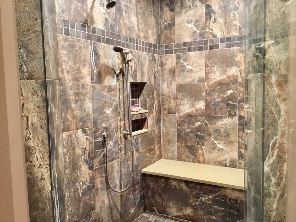 27 Algonquin Road Canton, MA 02021 - Photo 34 of 42 a bathroom with a shower and a sink