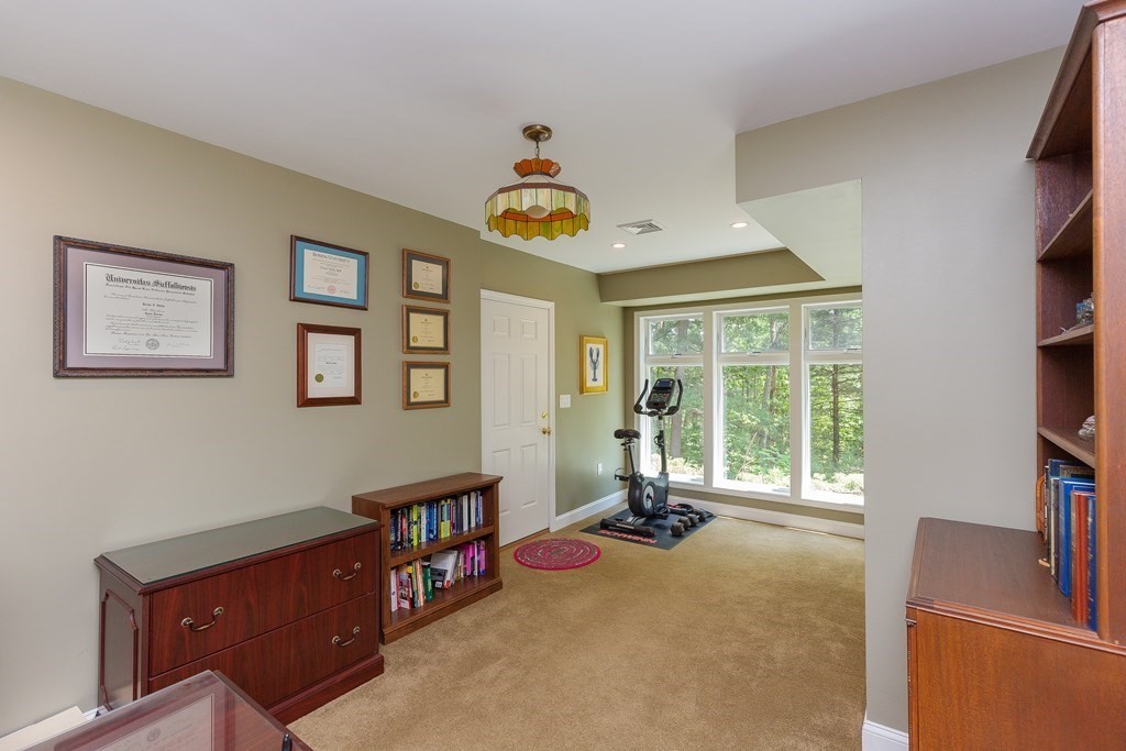 27 Algonquin Road Canton, MA 02021 - Photo 36 of 42 a living room with furniture window and flat screen tv