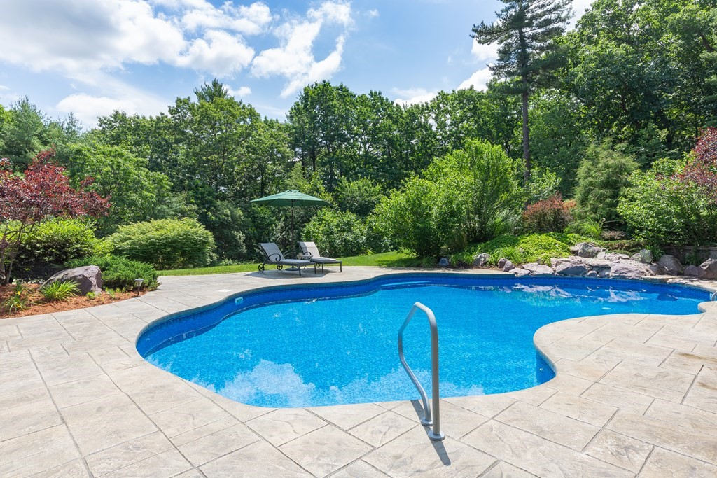 27 Algonquin Road Canton, MA 02021 - Photo 4 of 42 a view of swimming pool with seating space