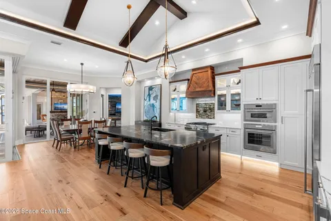 a bedroom with a large bed and a couch