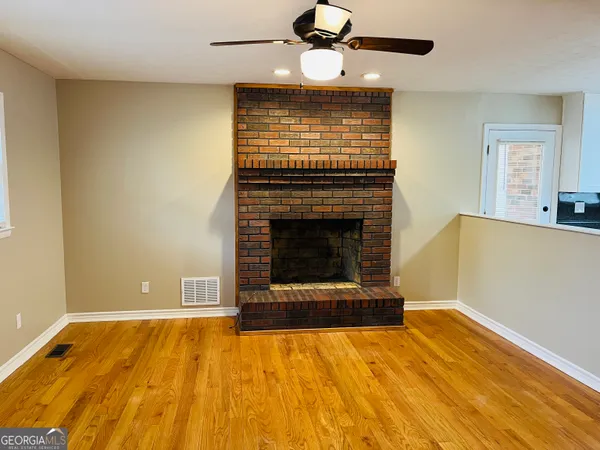a living room with a fireplace