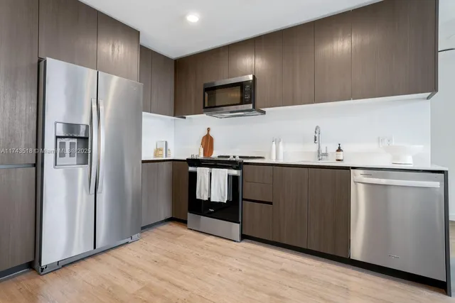 a bedroom with bed and window