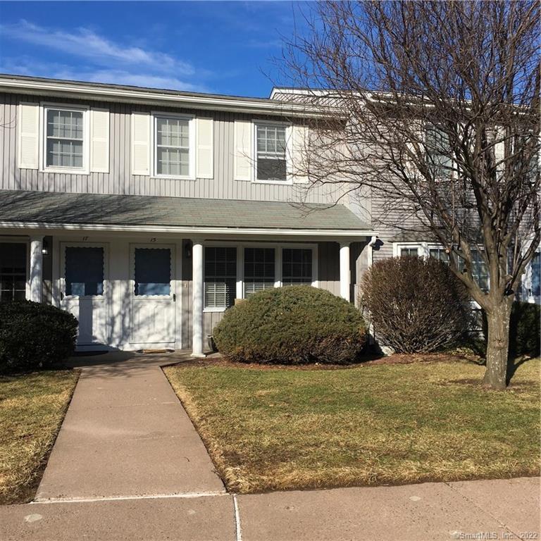 15 Joiners Road, Unit 15 Rocky Hill, CT 06067 - Photo 1 of 1 a front view of a house with a yard