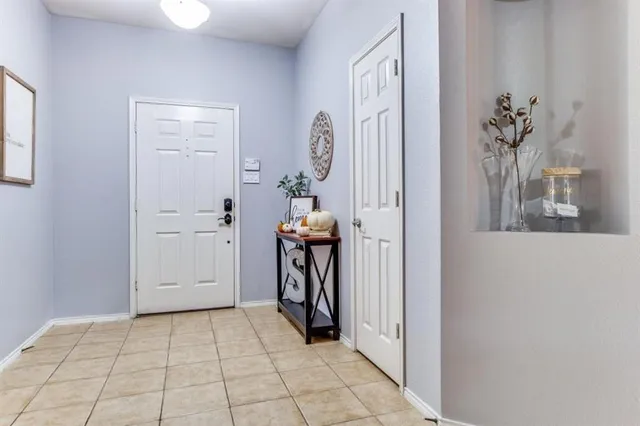 a view of a hallway with entryway